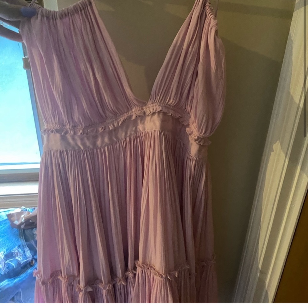Size M free people mini dress. Pink color and worn once